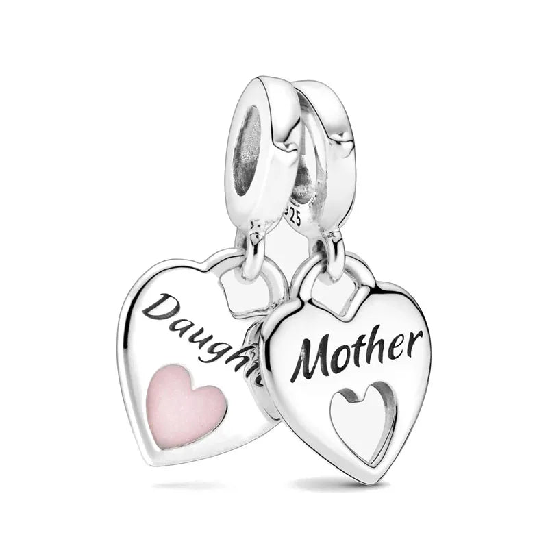 Celebrate family love with 925 Sterling Silver charm pendants featuring boy, girl & mom designs. Pandora compatible.