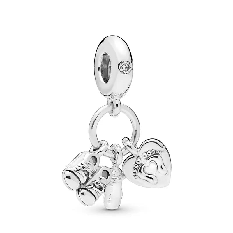 Celebrate family love with 925 Sterling Silver charm pendants featuring boy, girl & mom designs. Pandora compatible.