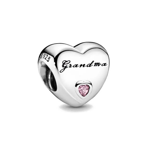 Celebrate family love with 925 Sterling Silver charm pendants featuring boy, girl & mom designs. Pandora compatible.