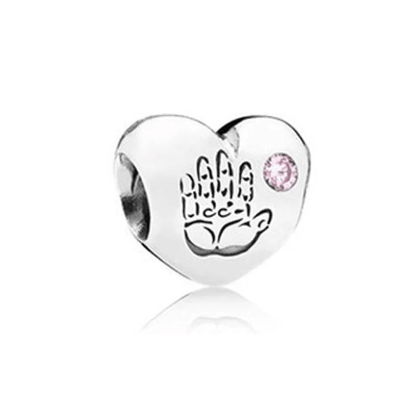 Celebrate family love with 925 Sterling Silver charm pendants featuring boy, girl & mom designs. Pandora compatible.