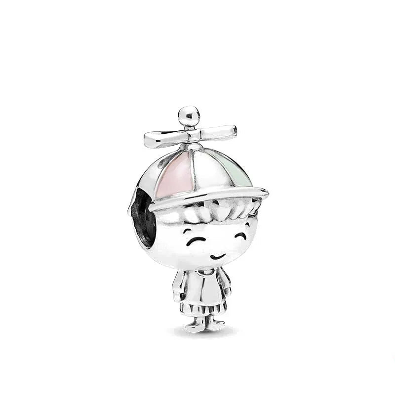 Celebrate family love with 925 Sterling Silver charm pendants featuring boy, girl & mom designs. Pandora compatible.