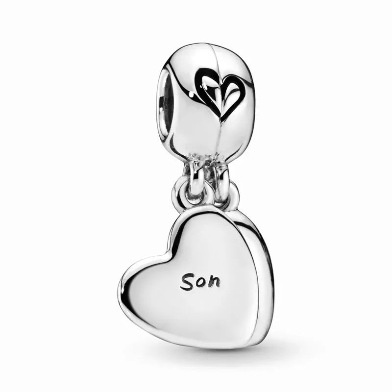 Celebrate family love with 925 Sterling Silver charm pendants featuring boy, girl & mom designs. Pandora compatible.