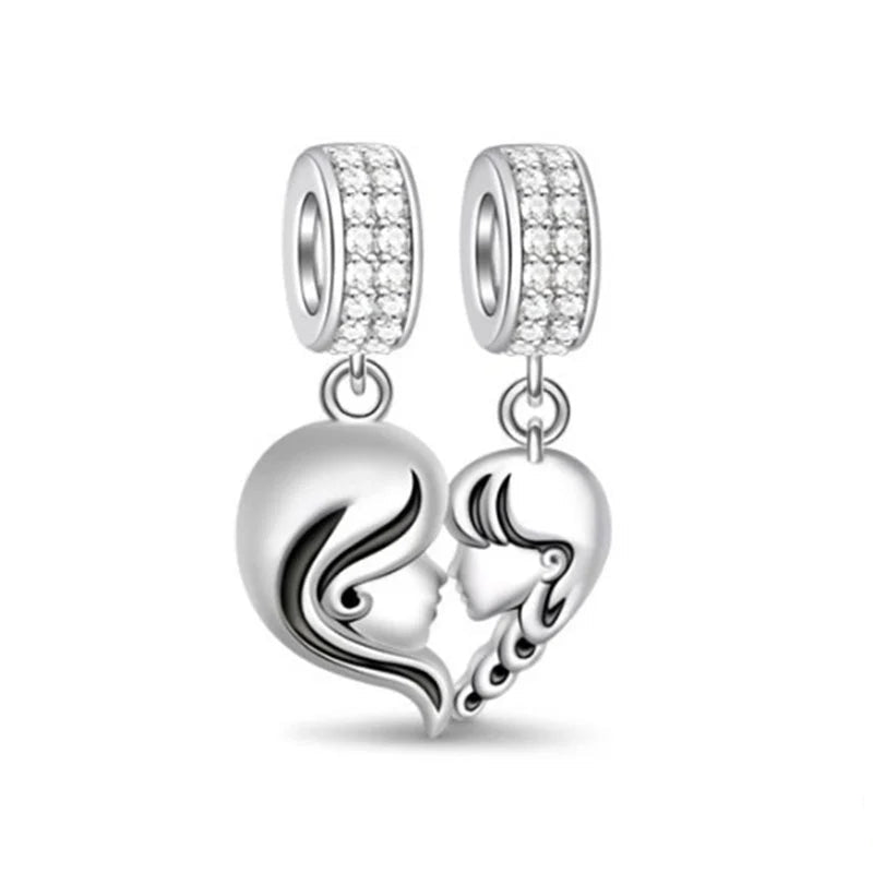 Celebrate family love with 925 Sterling Silver charm pendants featuring boy, girl & mom designs. Pandora compatible.