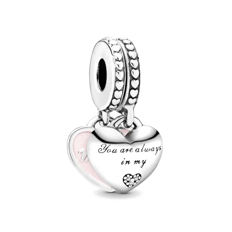 Celebrate family love with 925 Sterling Silver charm pendants featuring boy, girl & mom designs. Pandora compatible.