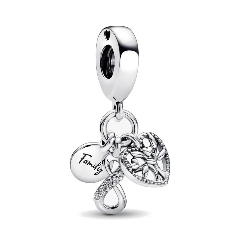 Celebrate family love with 925 Sterling Silver charm pendants featuring boy, girl & mom designs. Pandora compatible.